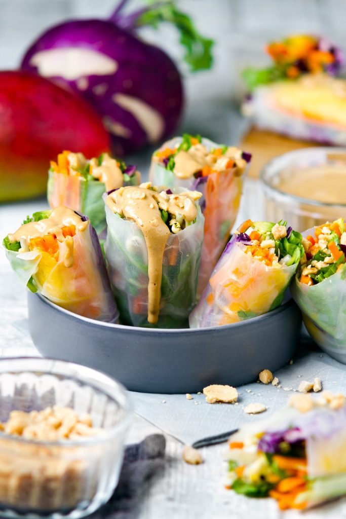 Raw rice paper wraps and satay sauce