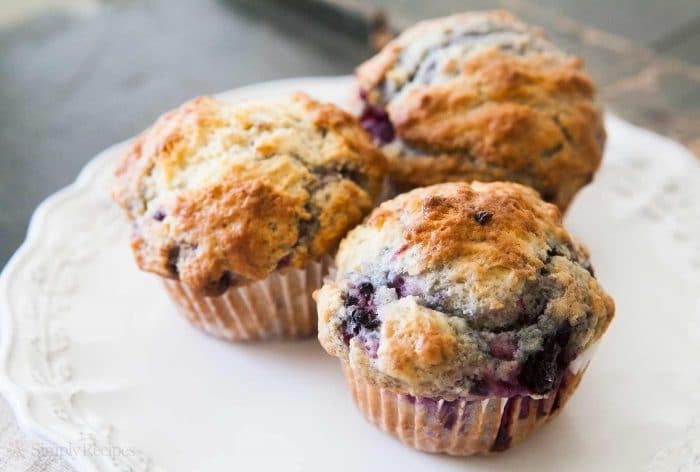three delicious blueberry filled muffins